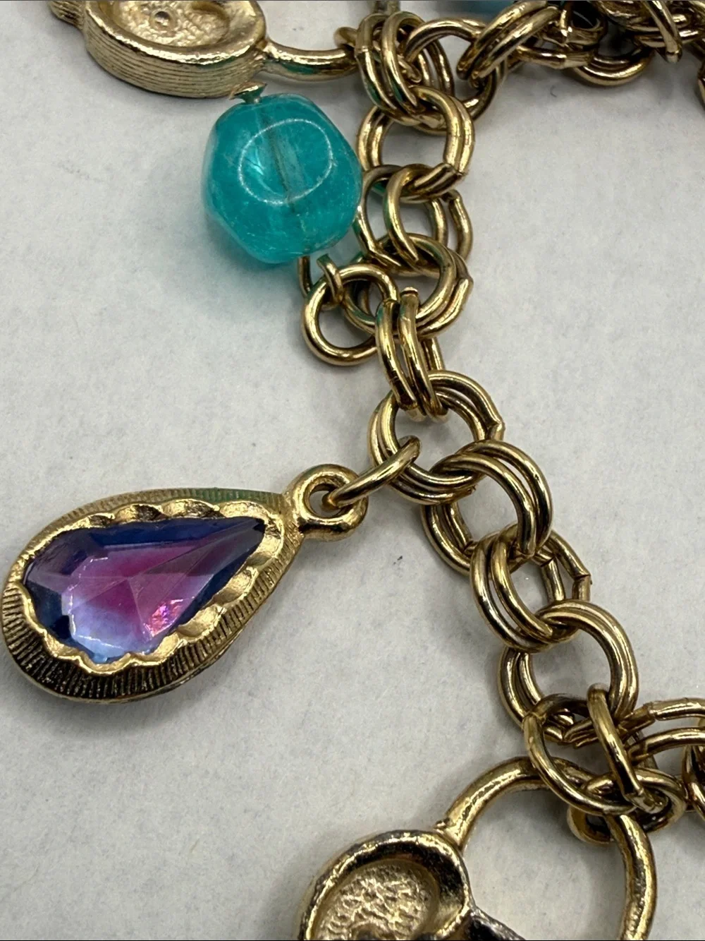 Whimsy Gold-Tone Charm Bracelet with Aqua Beads and Purple Teardrops lock & key